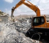 The occupation demolishes 3 homes in Jerusalem