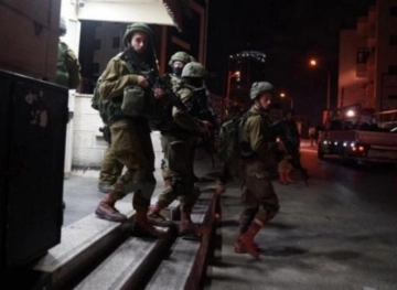 The occupation arrested two young men from Jerusalem