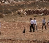 Citizens confront settlers and prevent them from leveling lands in Ni&acute;lin, west of Ramallah