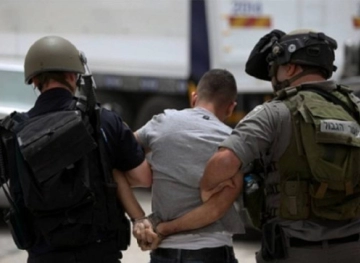 The occupation arrests a young man and a woman from occupied Jerusalem