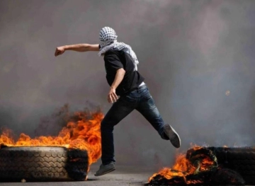 A young man was wounded during clashes with the occupation at the Beit El checkpoint