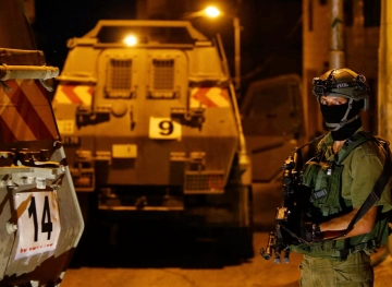 The occupation besieges the Abu Mishaal Monastery, injuring two young men with its fire and harassing the villagers