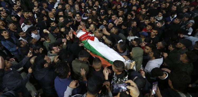 The masses of our people in Qalqilya bid farewell to the body of the martyr Abd al-Karim al-Sheikh