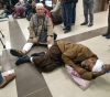 Victims of the 2014 aggression they sit inside UNRWA headquarters in Gaza