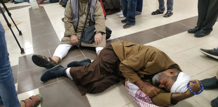Victims of the 2014 aggression they sit inside UNRWA headquarters in Gaza